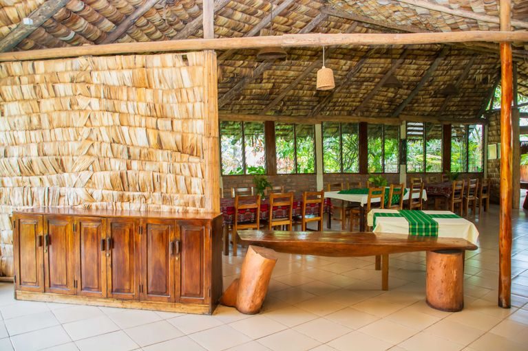 Dining area with carved timber furniture